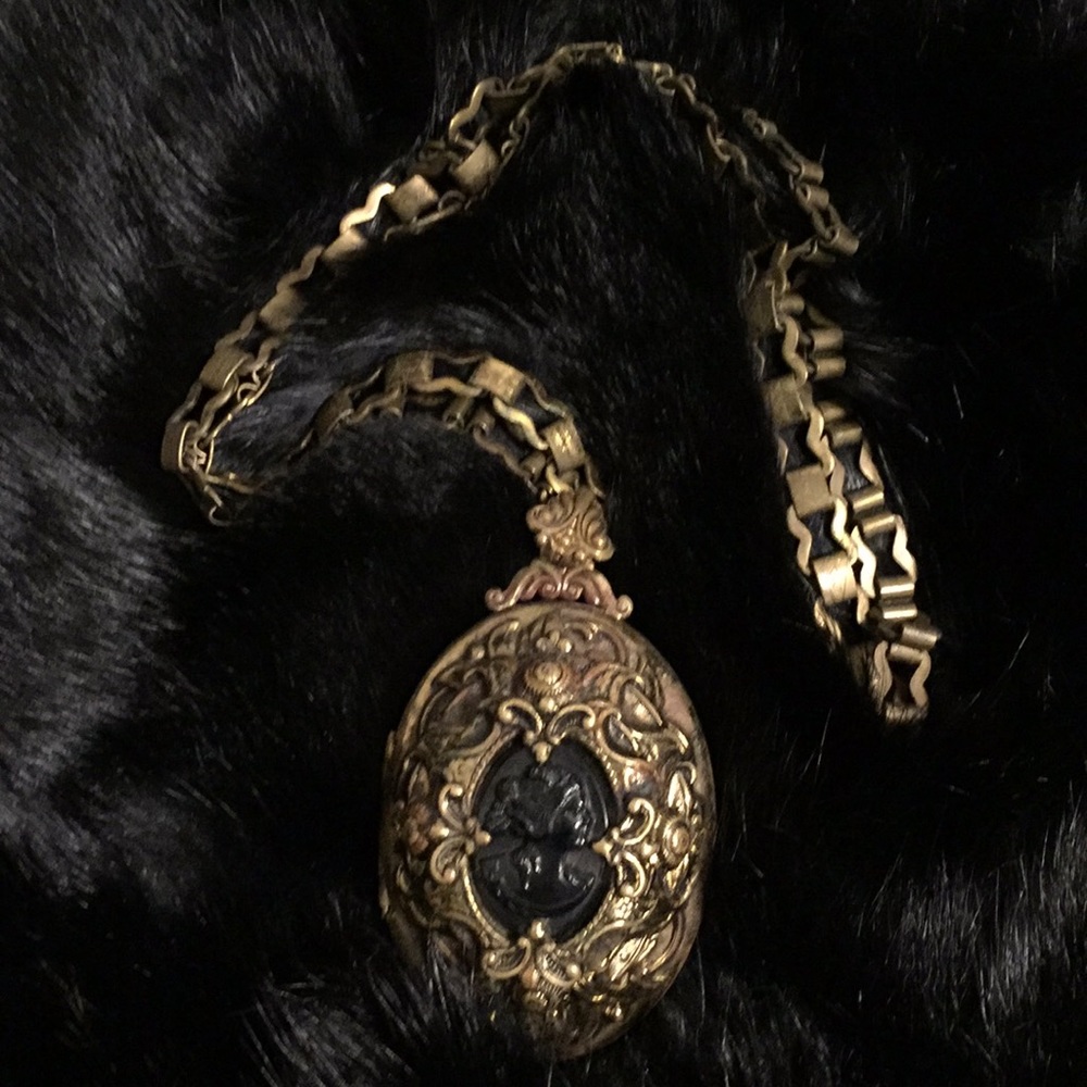 Vintage neo Victorian gothic cameo locket pendant.